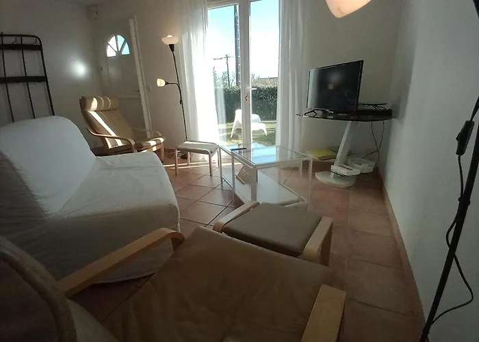 2 En Rez-de-jardin Lägenhet